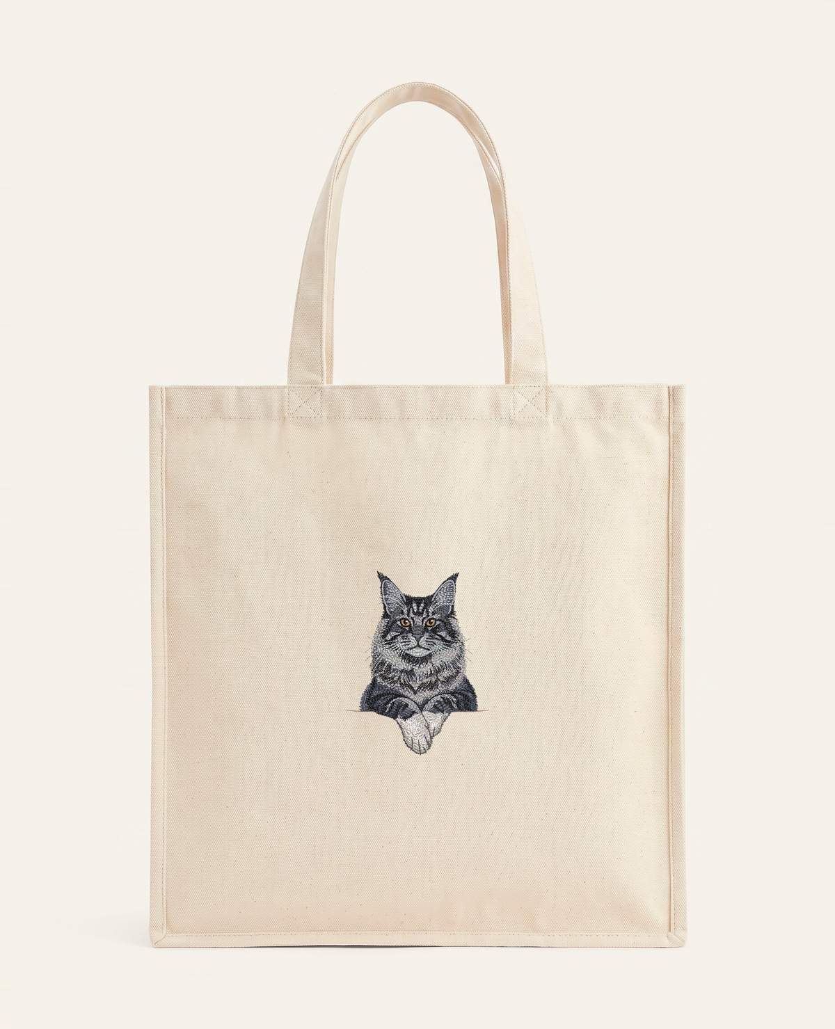 Maine coon (niebieski z białymi łapkami) – torba z haftem, piaskowa